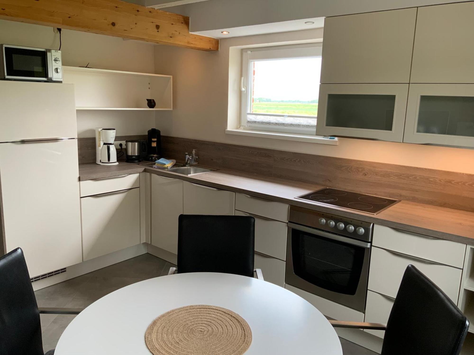 Ferienwohnungen Zollhaus Utlandshoern Norden Ruang foto